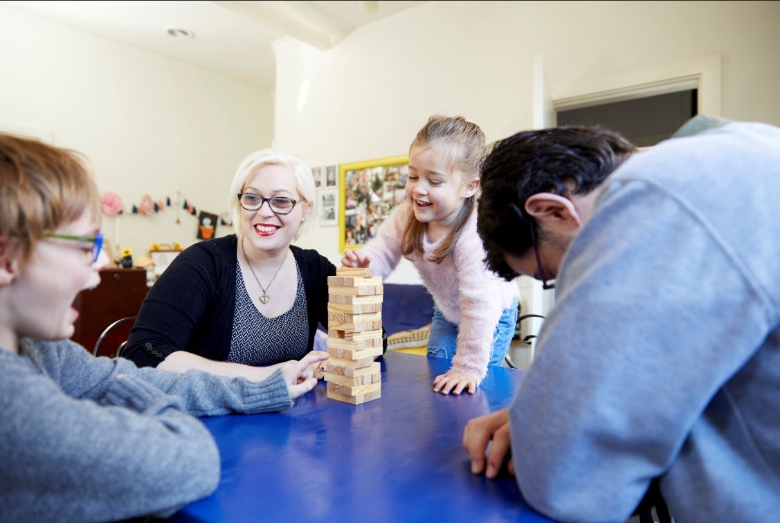 Loren and her family enjoy a game together